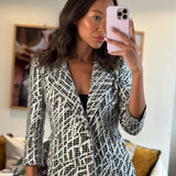 Chanel Black & White Checked Tweed Backless Jacket with Silver Screen Print and Pearl Belt at the Back Size FR 34 (UK 4)