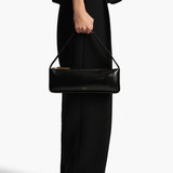 Khaite - Lori Baguette Bag in Black Crackle Patent Leather