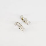 Alaïa Fluide Drop Hoop Earrings in Silver