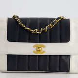 Chanel Black, White Vintage Mademoiselle Single Flap Bag in Lambskin Leather with 24K Gold Plated Hardware