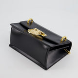 Balmain Black Ring Box 20 Flap Bag in Box Calfskin Leather with Gold Hardware and Medallion Closure Detail