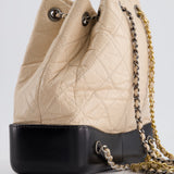 Chanel Nude, Black Mini Gabrielle Backpack in Aged Calfskin Leather with Ruthenium & Brushed Gold Hardware