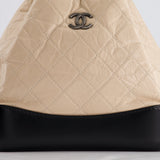 Chanel Nude, Black Mini Gabrielle Backpack in Aged Calfskin Leather with Ruthenium & Brushed Gold Hardware