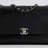 Chanel Black Matelasse Crumpled Calfskin Leather Flap Bag With Silver Hardware and Grosgrain Fabric Detailing