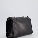 Chanel Black Matelasse Crumpled Calfskin Leather Flap Bag With Silver Hardware and Grosgrain Fabric Detailing